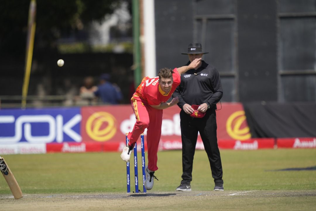 Raza hits century, Evans claims five-for as Zimbabwe fall just short